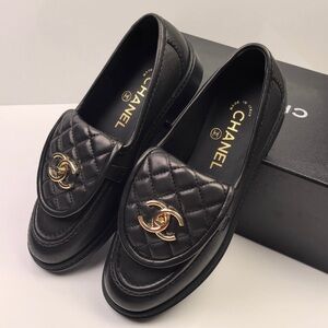 CHANEL Black Quilted Leather Loafers with Gold CC Emblem